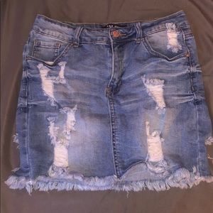 Distressed denim skirt